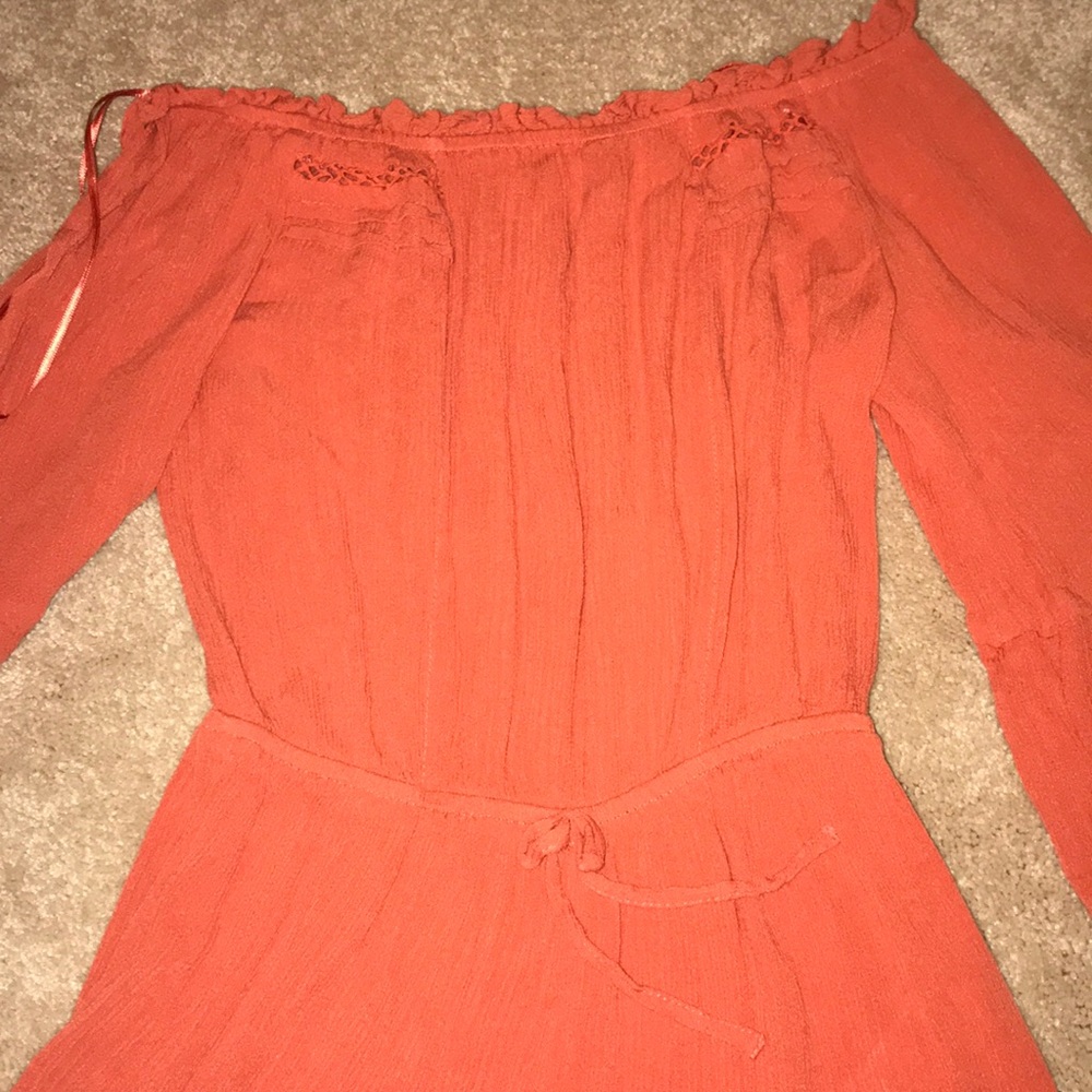 Orange off-the-shoulder romper